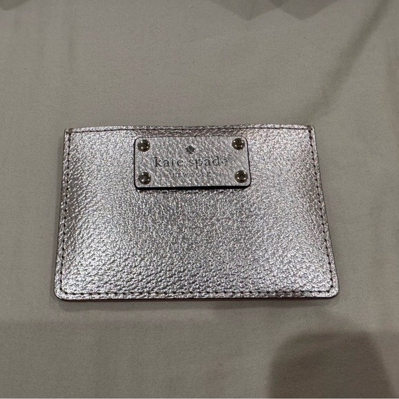 kate spade Handbags - Kate Spade Rose Gold Card Holder Wallet